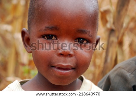 circa August 2014-Africa-Tanzania-African Unidentified children of the Village Pomerini hit by the AIDS virus. Between a present of misery, poverty and disease, and a future of hope contained in their eyes.