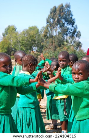 August 2014 - Village of Pomerini - Tanzania - Africa - The game of unidentified  kindergarten children built in the Franciscan Mission of the Village of Pomerini. Many of these children are suffering from AIDS.