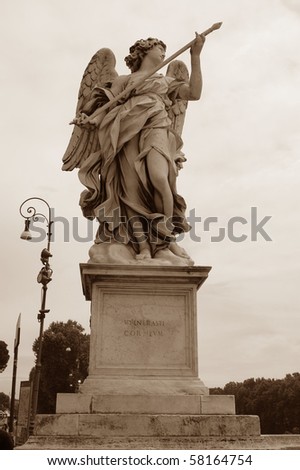 The statue of an angel in the cloudy sky of Rome