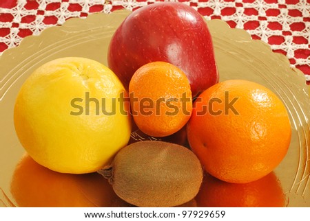 Mixed fruit 002 - A group of oranges, grapefruits, tangerines, apples and kiwi fruit for a healthy and nutritious breakfast