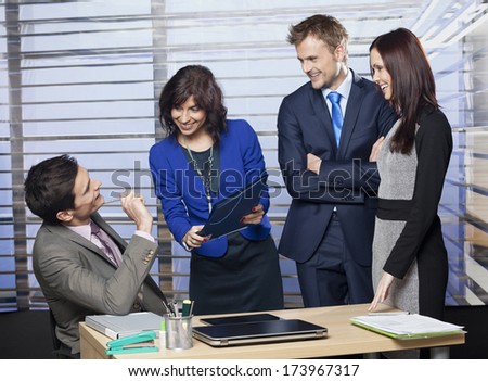 Group of business people working as a team at the office