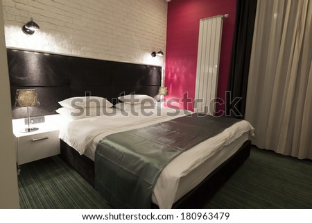 Interior of a luxury hotel bedroom in night