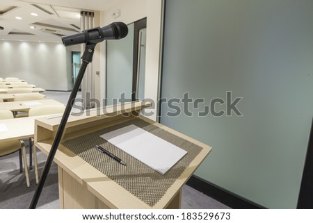 Speaker\'s table in Interior of a modern conference hall