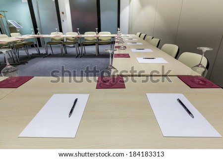 Tables prepared for conference in modern conference hall