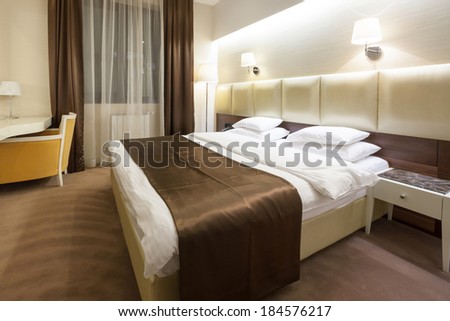 Interior of a hotel bedroom in the evening