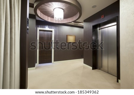 Interior of a corridor with passenger lift door