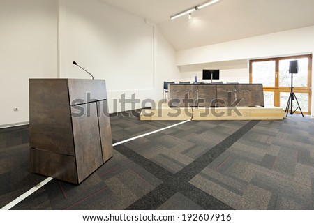 Speaker\'s table in modern conference hall