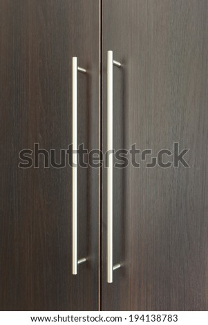 Wooden cabinet doors with metal handles