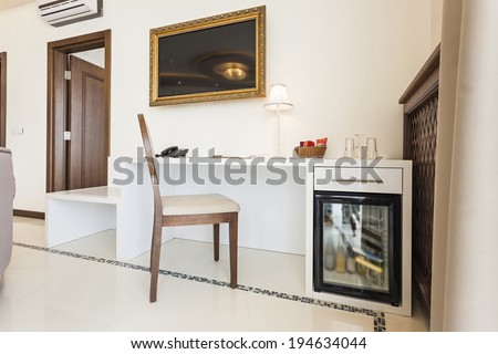 Luxury hotel room interior with mini bar