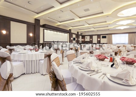 Wedding hall interior set for fine dining