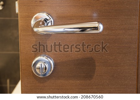 Door knob on wooden door