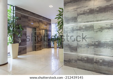 Hotel corridor with two elevators