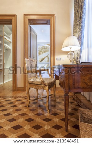 Desk and chair in luxury classic style room