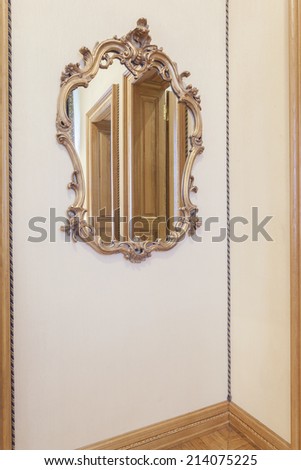 Antique mirror in the corner of a room