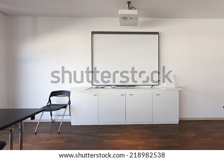 White board - projector screen in modern board room