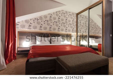 Interior of a luxury hotel bedroom in the evening