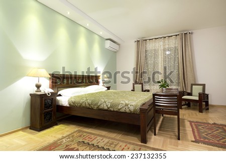 Colorful bedroom interior in the evening
