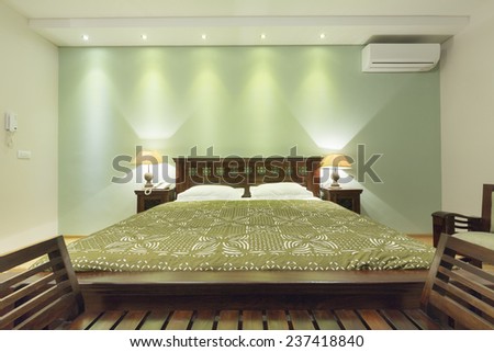 Colorful bedroom interior in the evening