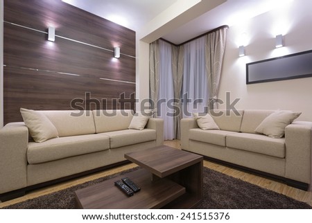 Modern living room interior in the evening
