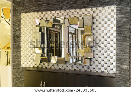 Mirror on the wall of hotel restaurant