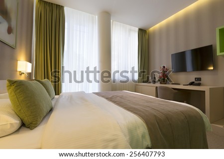 Interior of a hotel bedroom in the morning