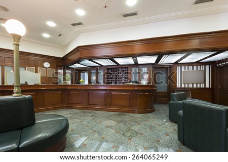 Interior of a hotel lobby with reception desk