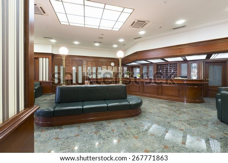 Shiny Interior of a hotel lobby with reception desk