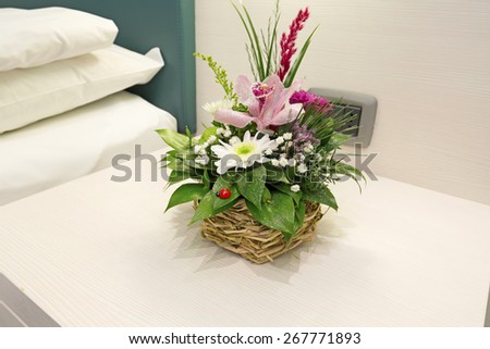 Flowers in a hotel room to welcome new guests
