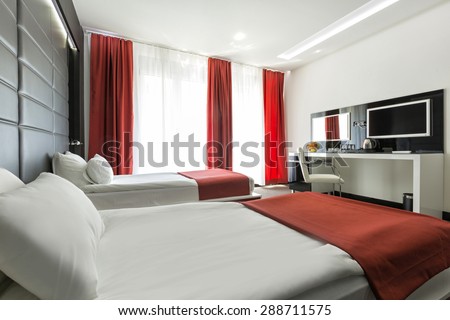 Double bed hotel bedroom interior