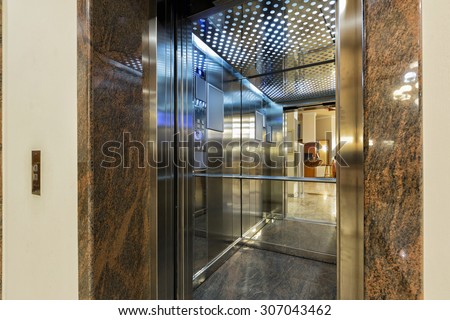 Passenger lift with open door