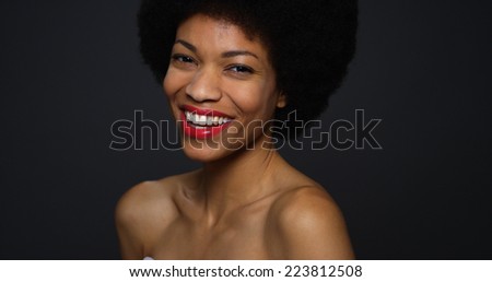 Sultry Black woman wearing elegant gown