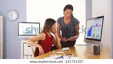 Professional team of multi-ethnic businesswomen working in office