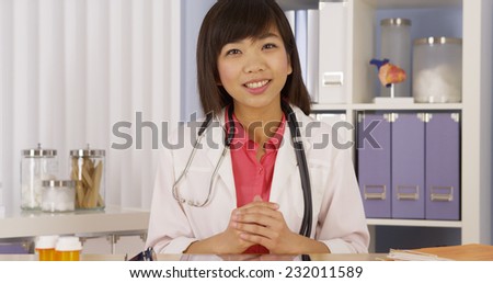 Chinese doctor talking to camera