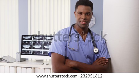 Portrait of black male medical doctor in hospital