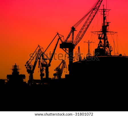 Silhouette of sea port cranes in the morning, St.Petersburg, Russia