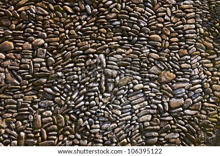 Pebble pavement closeup for horisontal design background