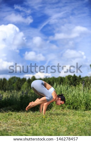 girl doing yoga outdoor, vertical