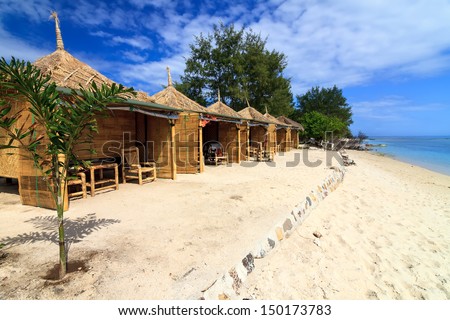Tropical beach bungalow on ocean shore, Gili Meno, Lombok, Indonesia