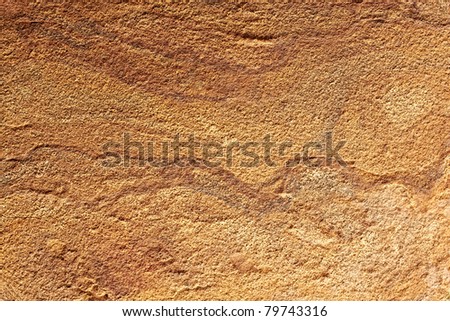 Yellow rough stone texture closeup horizontal background