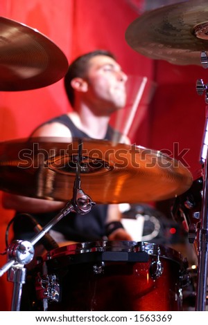 Drummer in action. Focus is on drums, not on drummer.