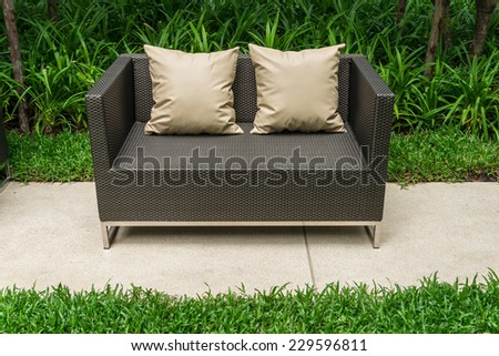 Outdoor patio seating area with Rattan sofa