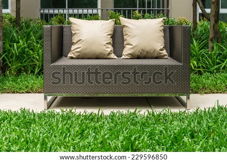 Outdoor patio seating area with Rattan sofa