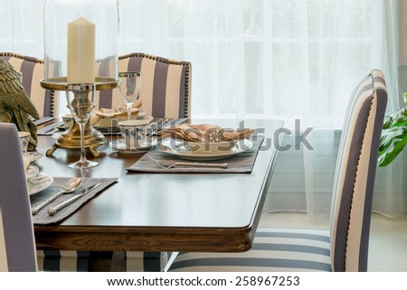 luxury table set in classic style dining room interior