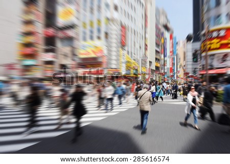 Blur image of Pedestrians walk at Kabuki-cho district, Tokyo, Japan