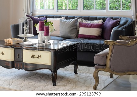 luxury living room design with classic sofa, armchair and decorative set on wooden table