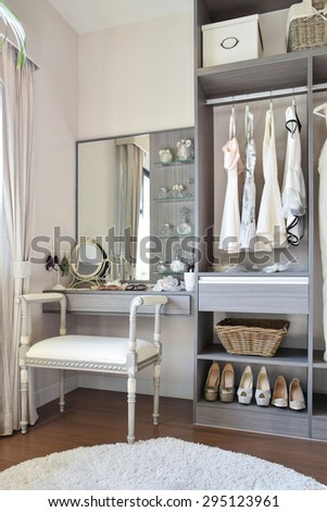 vintage style dressing room with classic white chair and dressing table