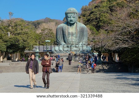 Kamakura, Japan - December 5, 2013: Daibutsu, People came to pray the bronze statue of Amitabha Buddha located at the Kotokuin Temple in Kamakura, Japan