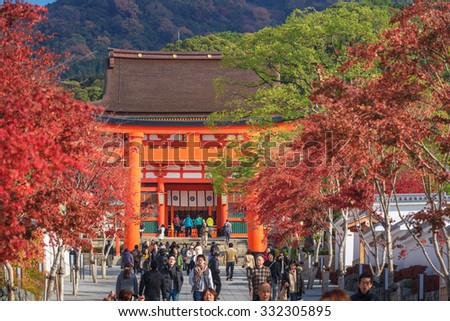 Kyoto, Japan - December 01, 2013 : Tourism walking around Main gate of Fushimi Inari-taisha shrine in Kyoto, Japan.