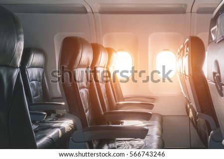 Empty seats and window inside an aircraft