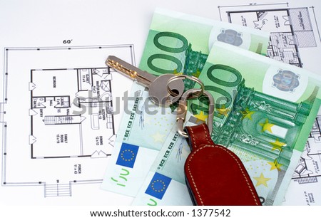 Key and money on home plan background